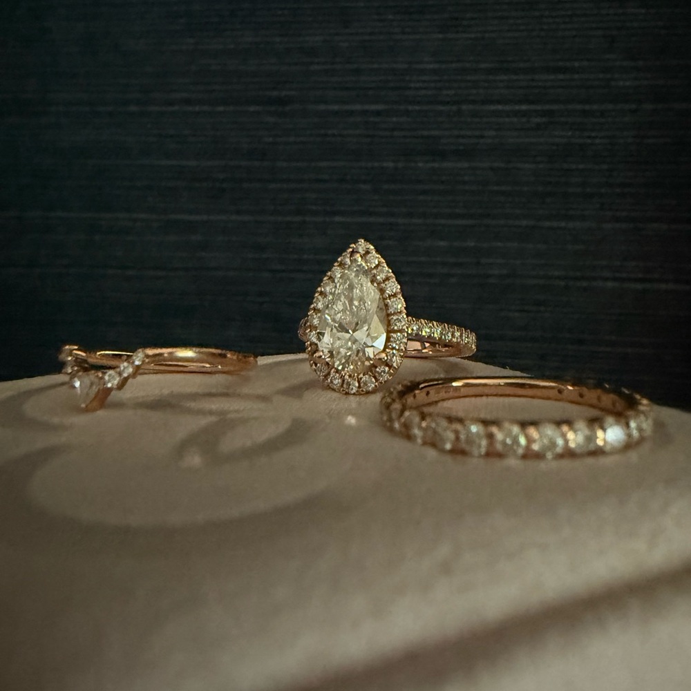 2.54 carat engagement ring with an elegant rose gold over a carat ring set.